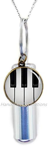 RukovanjeDecoracija klavir Kremacija URN ogrlica crno-bijela tastatura URN-Music nakit-staklena kupola